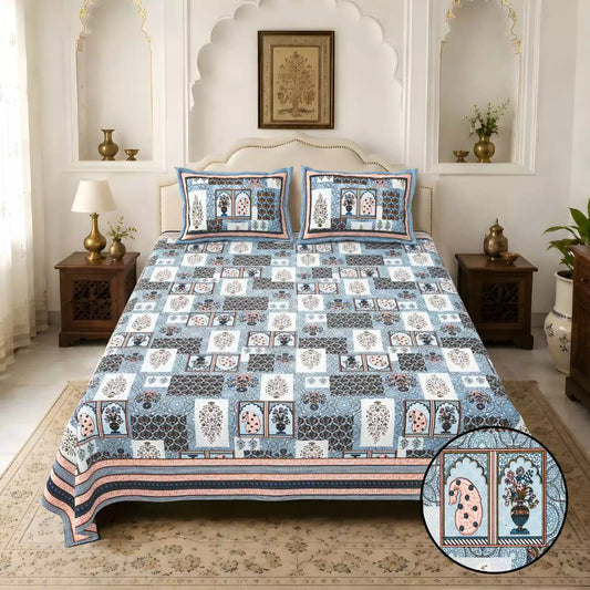 Jaipuri block print cotton bedsheet with pillow covers showcased on a bed in an elegant decor setting.