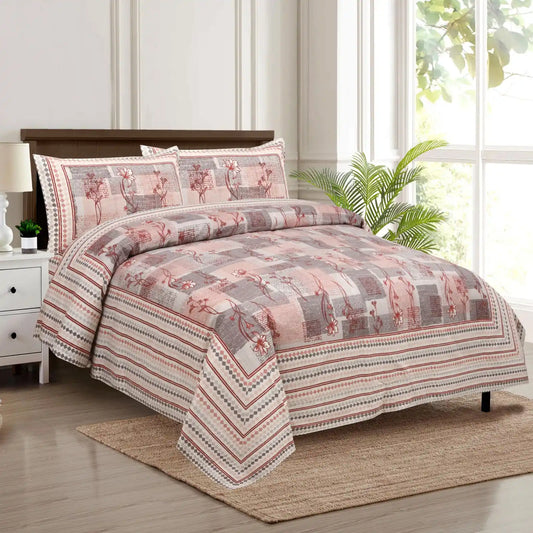 Jaipuri cotton king size bedsheet and two pillow covers on a king bed in a stylish bedroom setting.