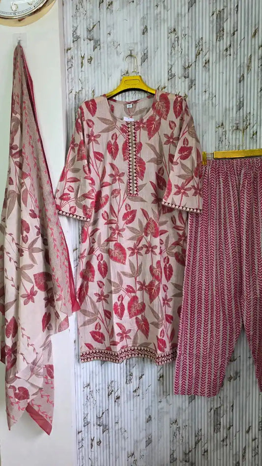 Karachi embroidered cotton suit with dupatta displayed with pant and printed dupatta, featuring floral designs.
