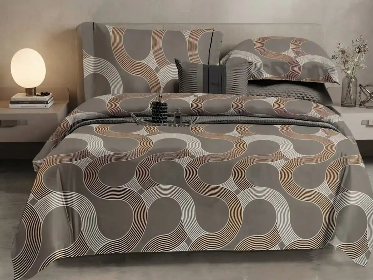 Queen size cotton bedsheet set in stylish circular design, featuring soft colors and smooth fabric, perfect for modern bedrooms.