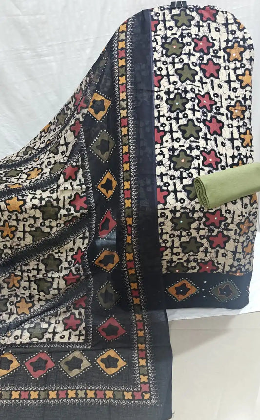 Pure cotton wax batik fabric displaying intricate patterns and vibrant colors, perfect for stylish and comfortable wear.