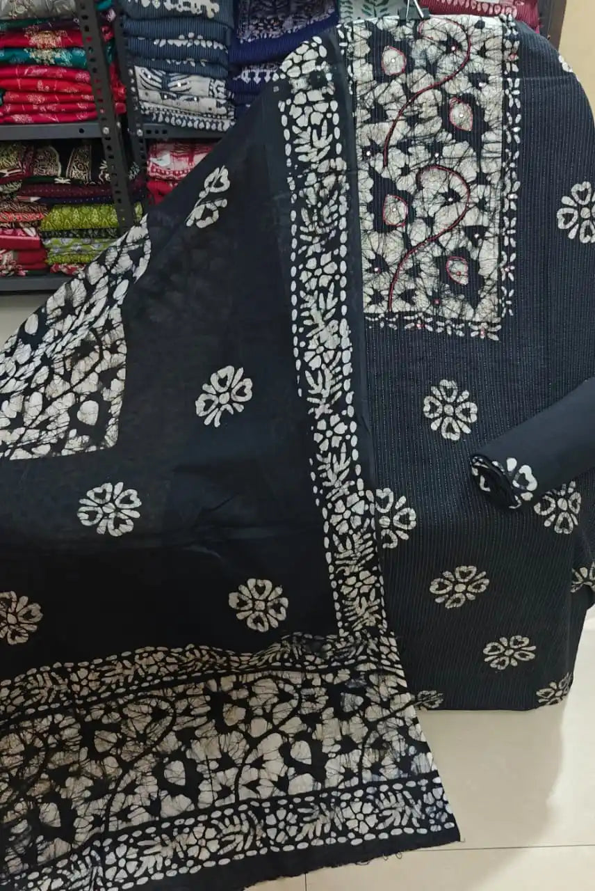 Classic black unstitched cotton batik fabric featuring a detailed cream-colored embroidered neck panel layout by ASC Fashion Store.