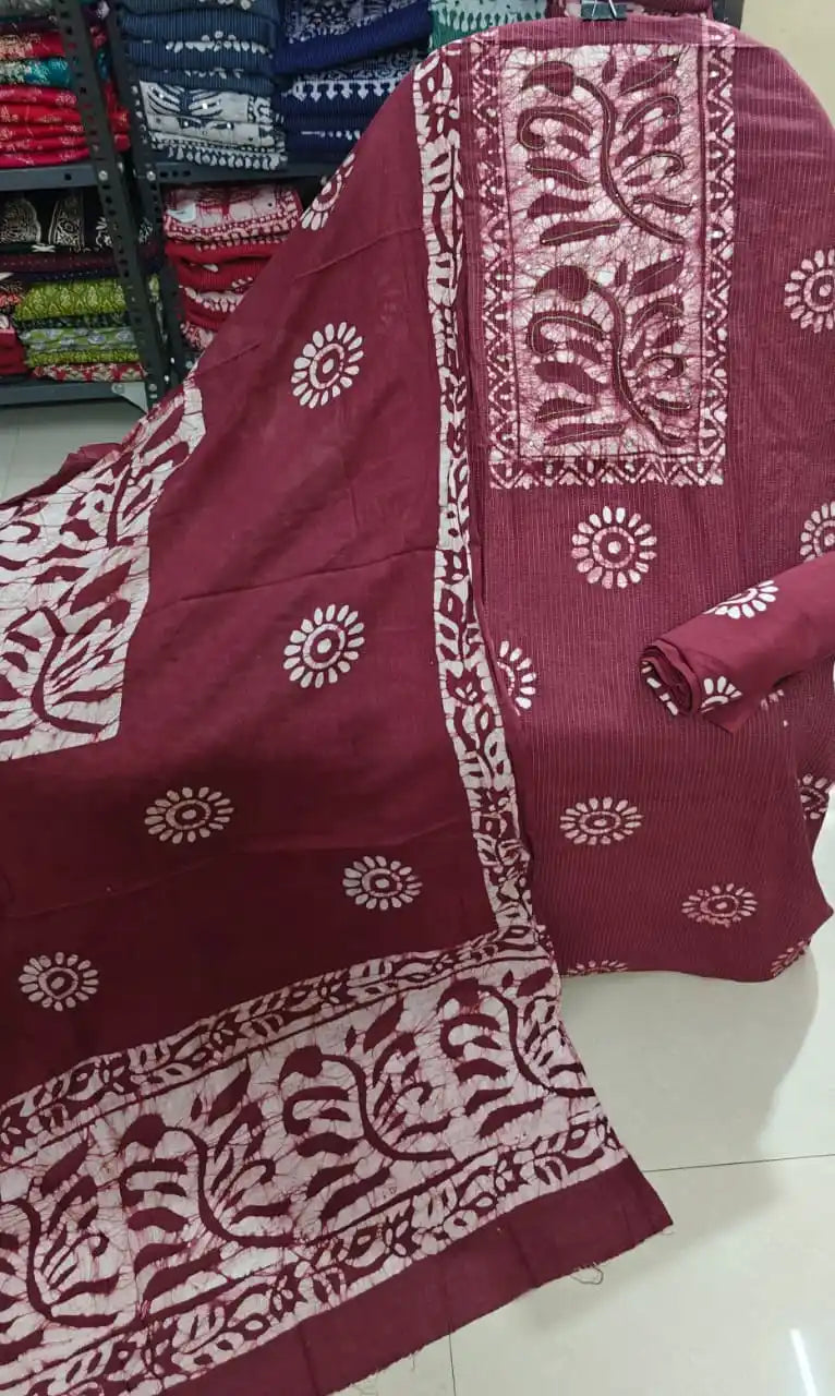Rich burgundy wine unstitched batik cotton suit piece featuring an elegant embroidered neck border design from ASC Fashion Store.