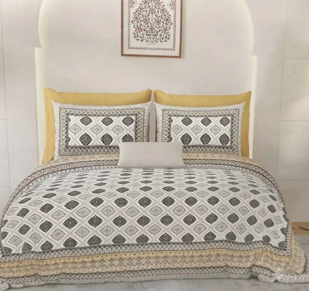 Premium jaipuri cotton super king bedsheet displayed on a stylish bed with decorative pillows and artwork.