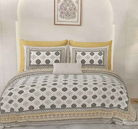 Premium jaipuri cotton super king bedsheet displayed on a stylish bed with decorative pillows and artwork.