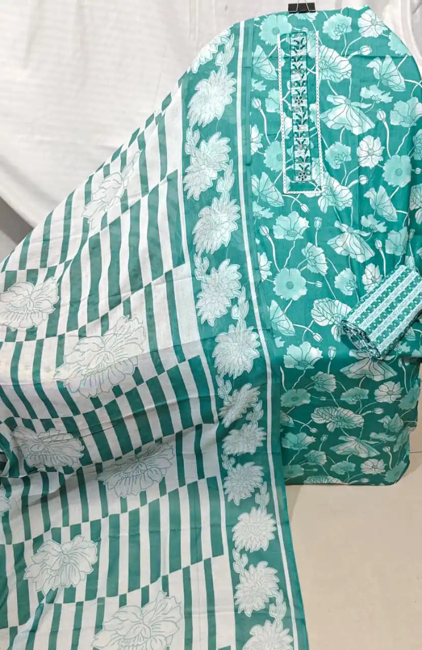 A vibrant mint teal green cotton unstitched dress material by ASC, featuring a dense white lotus flower and bud print on the shirt, a sleek vertical embroidered border neck patch, a small geometric grid print bottom, and a striking white dupatta adorned with thick teal block stripes and large floral borders.