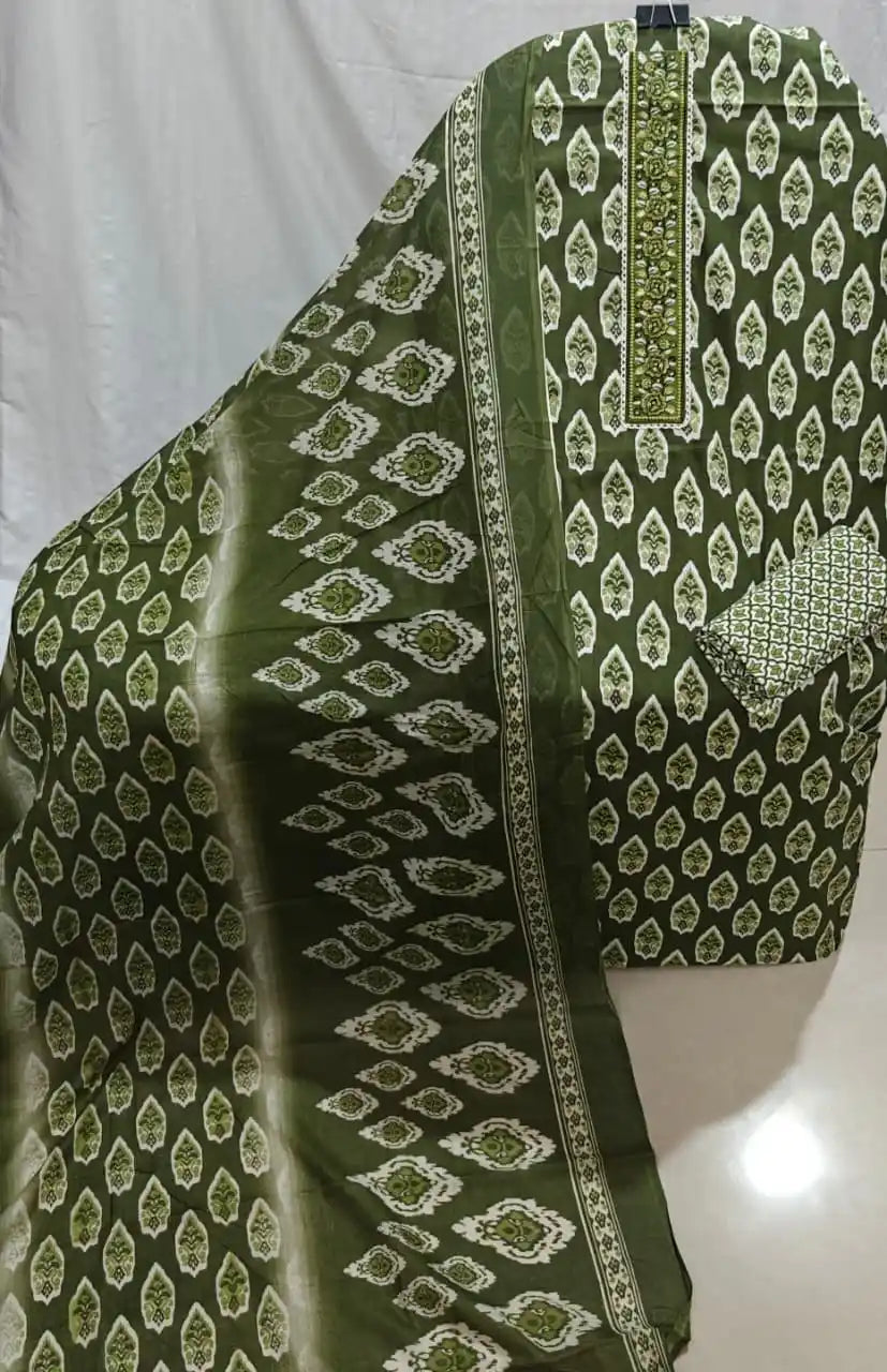 A showcase of an olive green cotton unstitched suit fabric by ASC, decorated with white leafy bootis, an embroidered neck design, and a matching cotton dupatta.