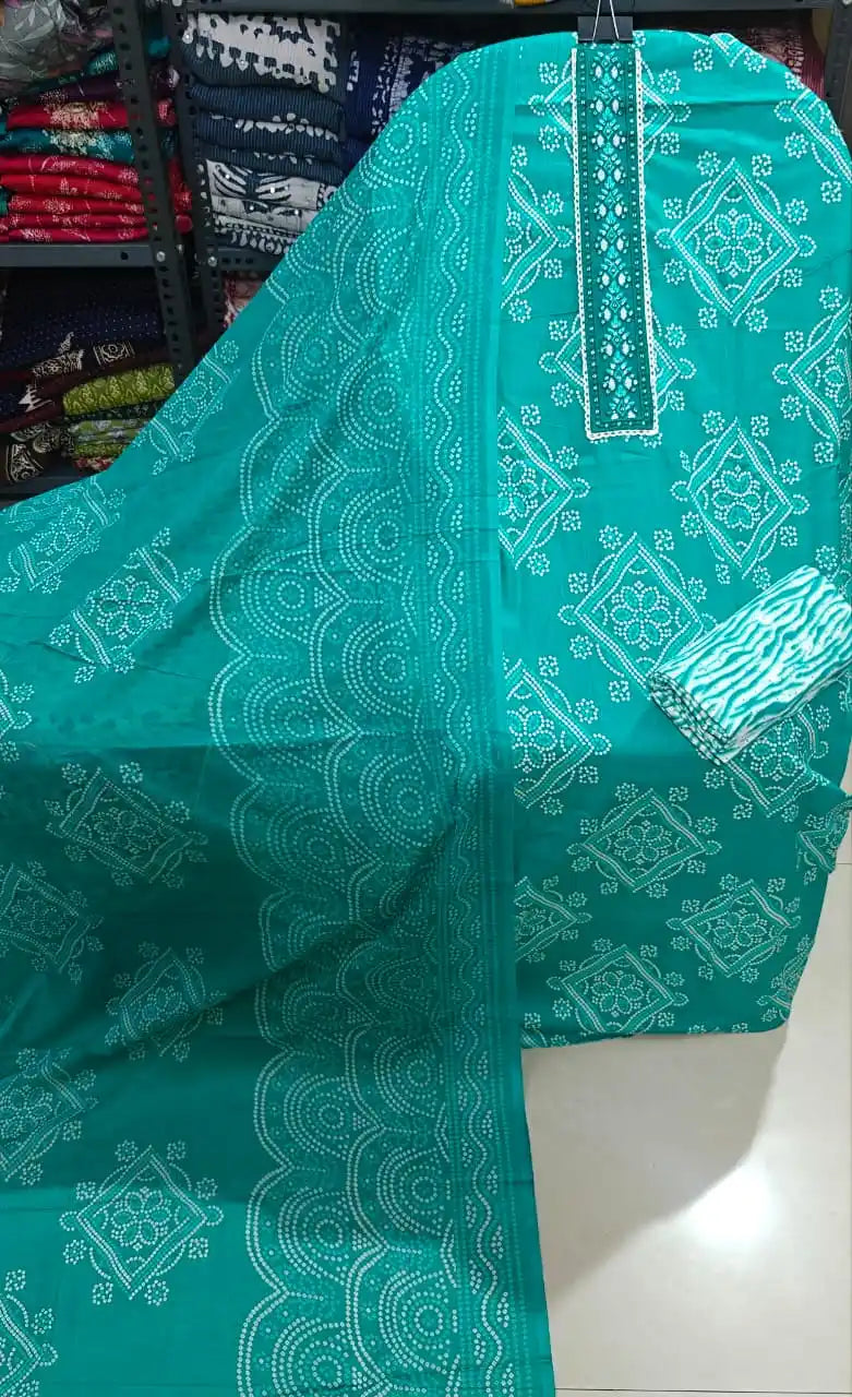 Rama green unstitched suit with traditional geometric patterns and a sleek neck patti.
