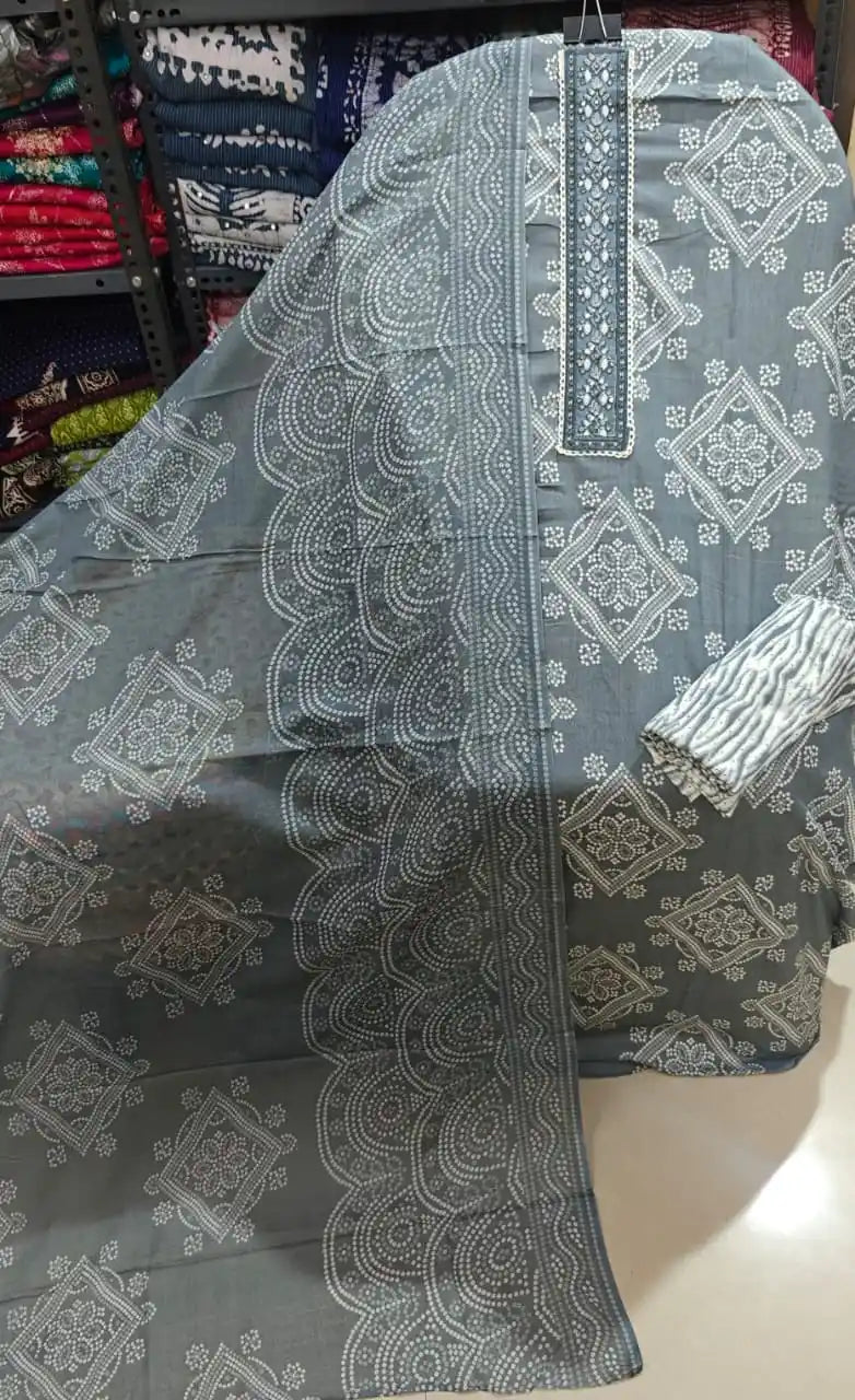 Grey geometric wave cotton suit featuring elegant diamond prints and wavy-border dupatta.