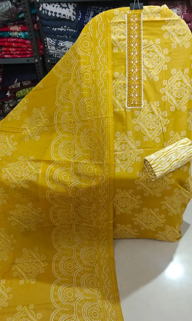 Mustard yellow ethnic suit with intricate geometric patterns by ASC Fashion Store, showcasing vibrant color and style.