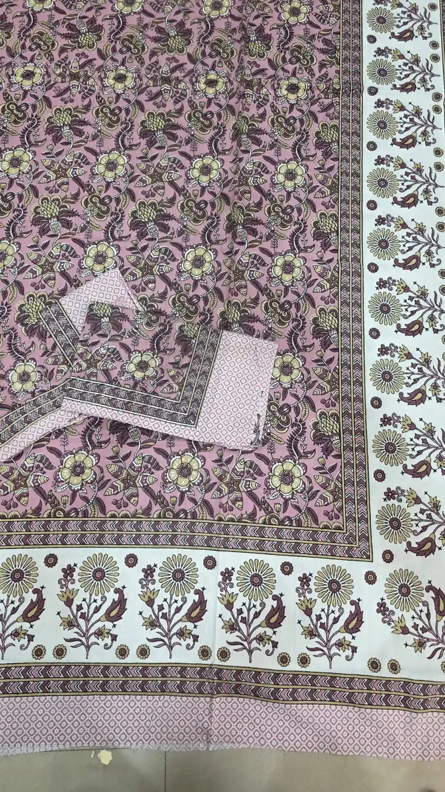 JAIPURI DOUBLE BEDSHEET (7x8 ft) featuring vibrant floral patterns and traditional designs in pink and white.