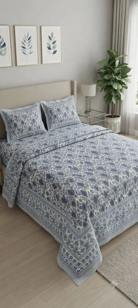 Jaipuri cotton super king bedsheet in elegant blue floral design, enhancing bedroom decor with luxury and comfort.