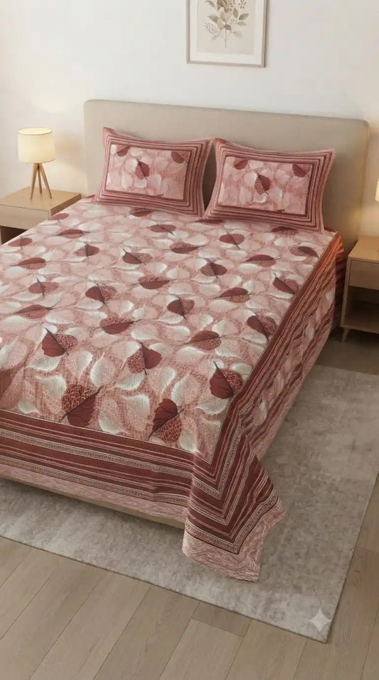 Floral Block Print King Bedsheet on bed with matching pillow covers in warm tones at ASC Fashion Store.