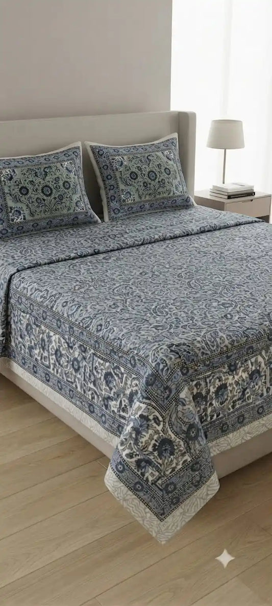 Floral block print super king bedsheet displayed on a bed with matching pillows, enhancing home decor.
