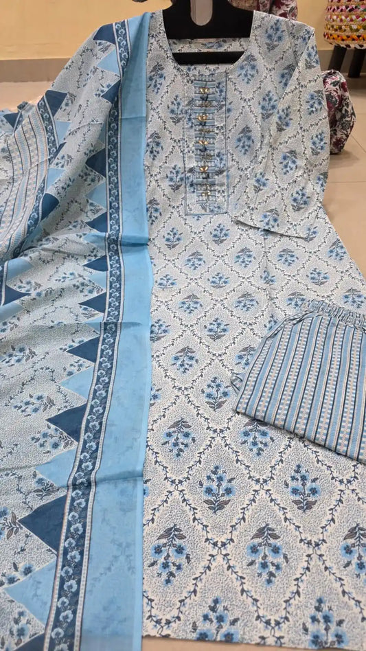 Light blue floral printed cotton salwar suit with an elegant embroidered neckline and dupatta.