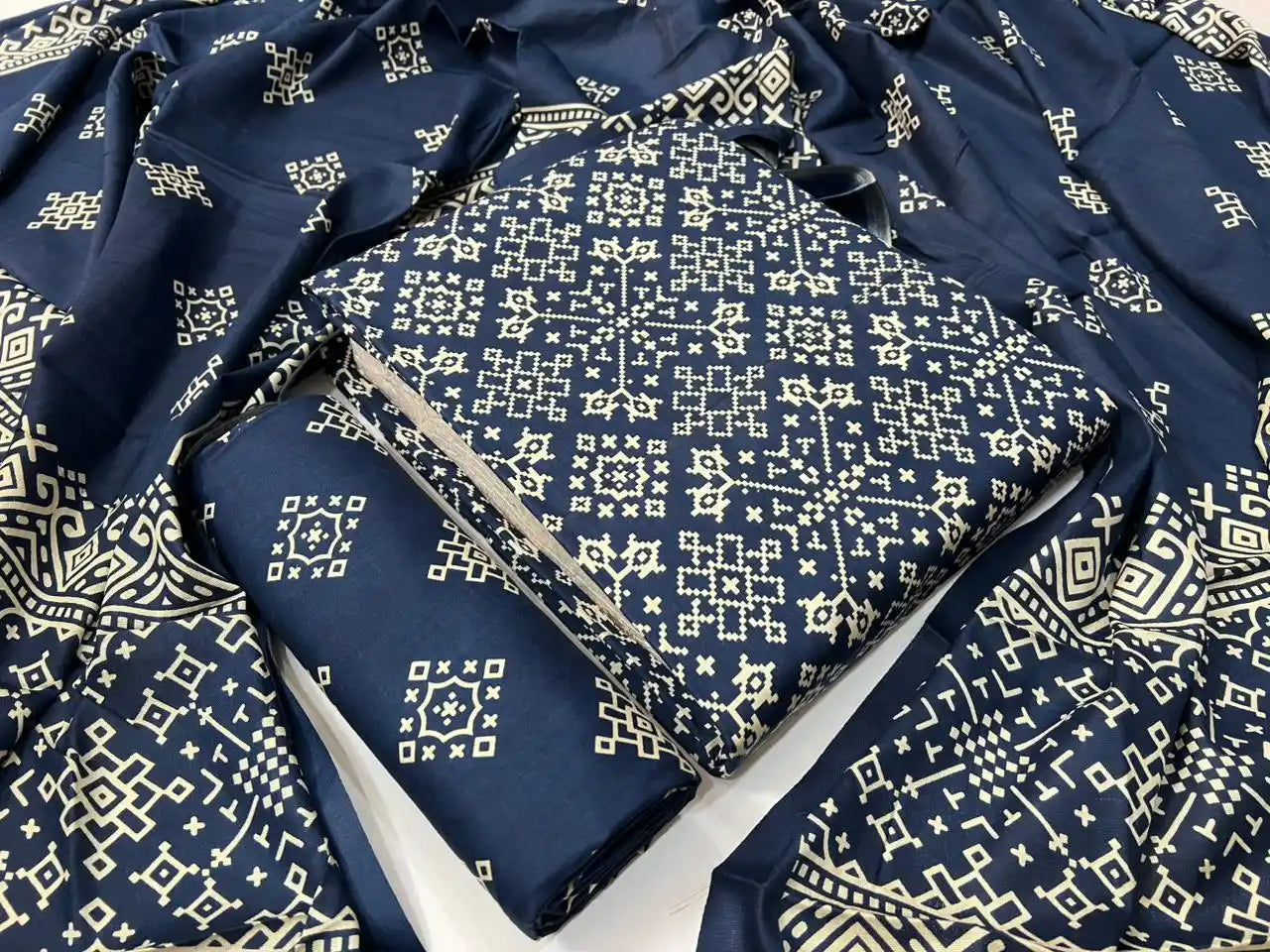 Rayon unstitched navy blue suit with intricate geometric ajrakh hand-block print details, coordinated bottom fabric, and a printed dupatta by ASC Fashion Store.
