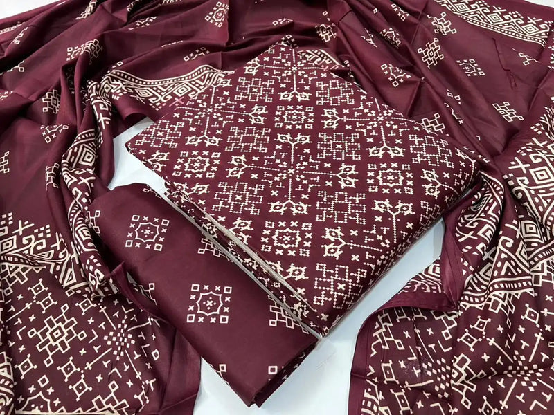 Rayon unstitched dark maroon salwar suit featuring an all-over traditional ethnic geometric ajrakh block print pattern by ASC Fashion Store.