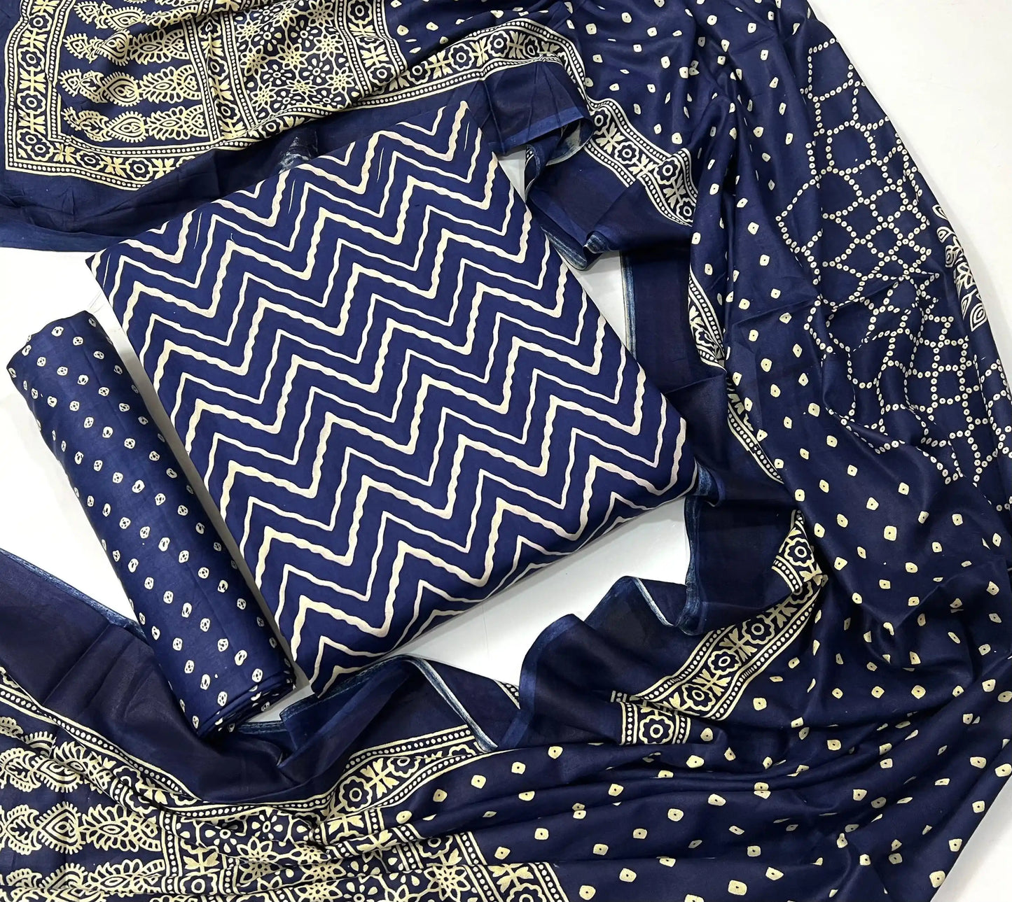 Indigo blue unstitched rayon dress material featuring handblock ajrakh wave print with a coordinated printed dupatta and salwar fabric.