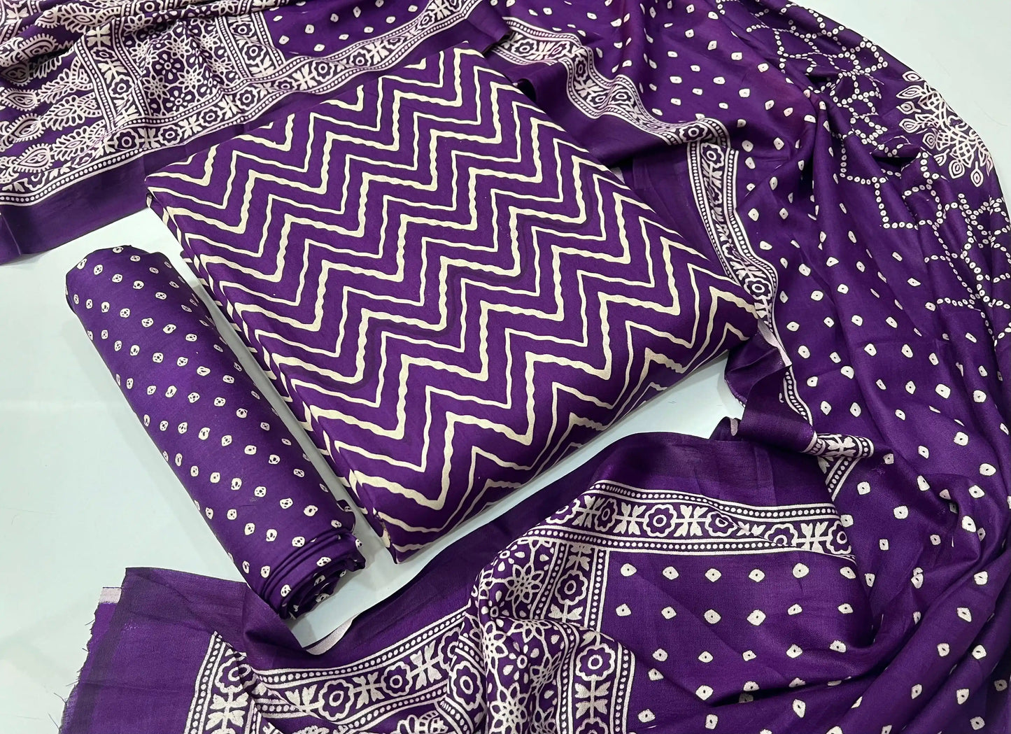 Royal purple unstitched rayon salwar suit set showcasing traditional wave-style handblock ajrakh print with full-length dupatta.
