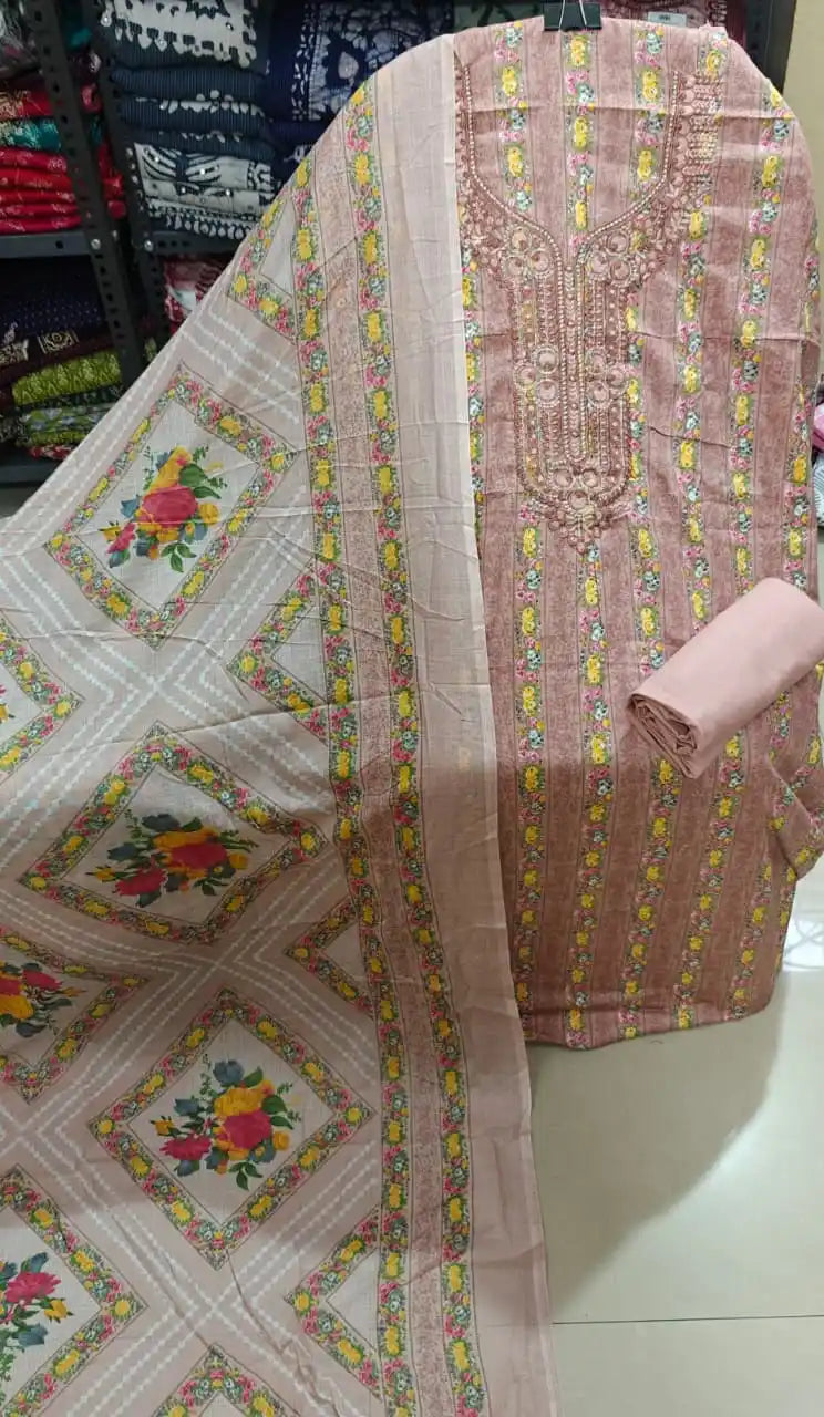 Soft dusty pink cotton unstitched suit set with elegant neck embroidery.