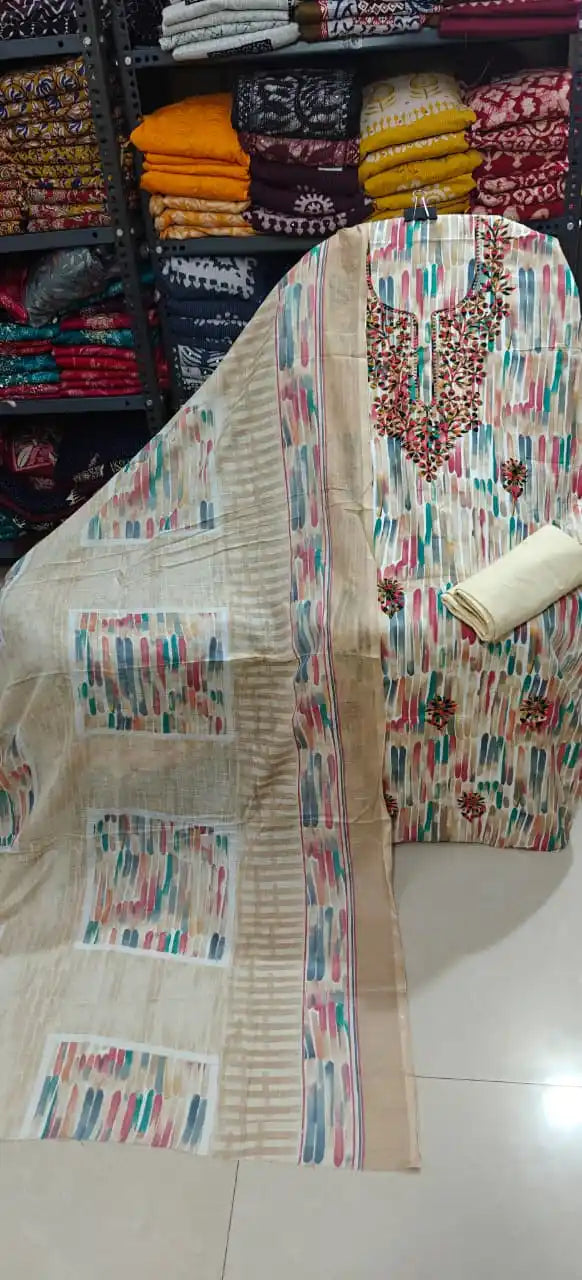 Trendy white cotton unstitched suit with vibrant colorful brush stroke prints.