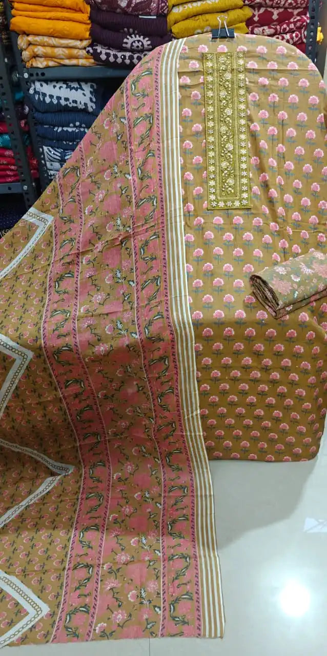 Mustard ochre floral unstitched suit with embroidered neck panel and pink bootis, by ASC.