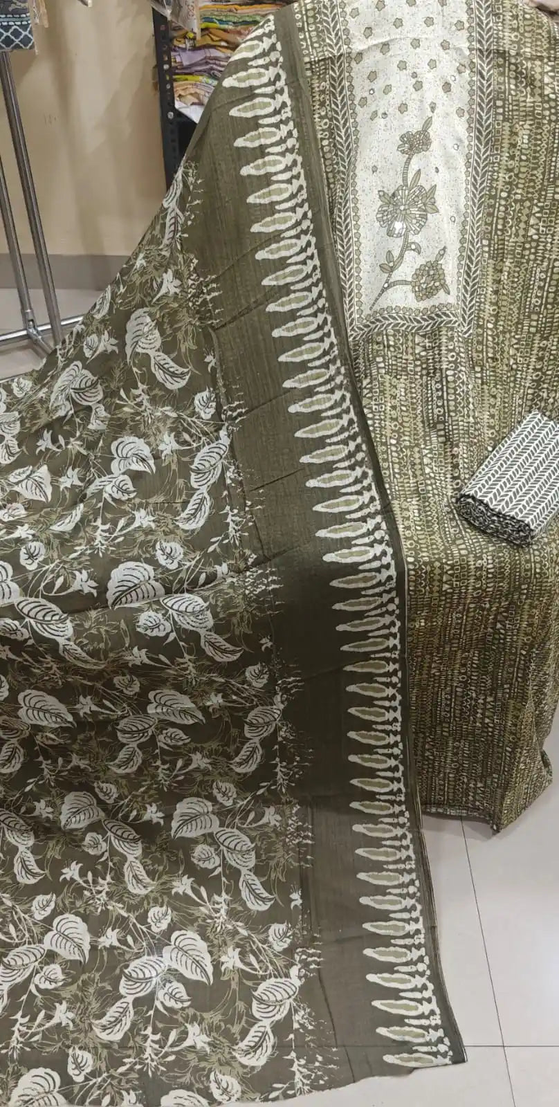 Earthy olive green cotton suit with a textured block print design, a floral front panel, and a patterned dupatta.