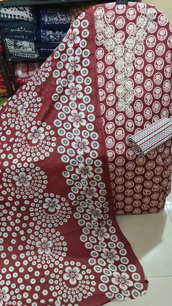 Daily wear maroon floral cotton suit with white floral ring print and lace embroidery from ASC Fashion Store.