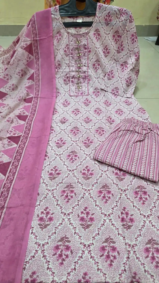 Onion pink floral print soft cotton suit featuring a detailed embroidered neck patch.