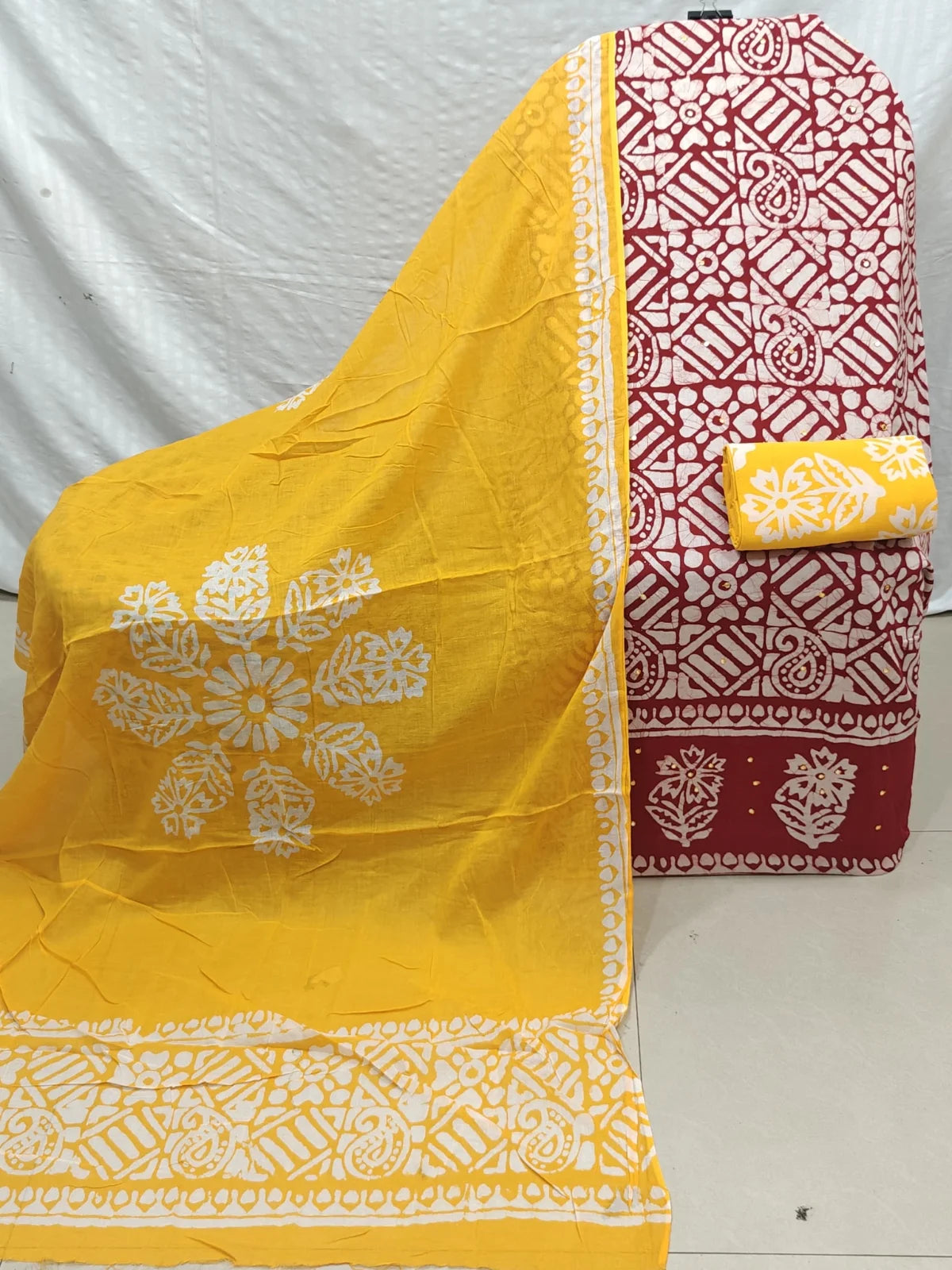 Red & Yellow Geometric Paisley Wax Batik Cotton Unstitched Suit By ASC