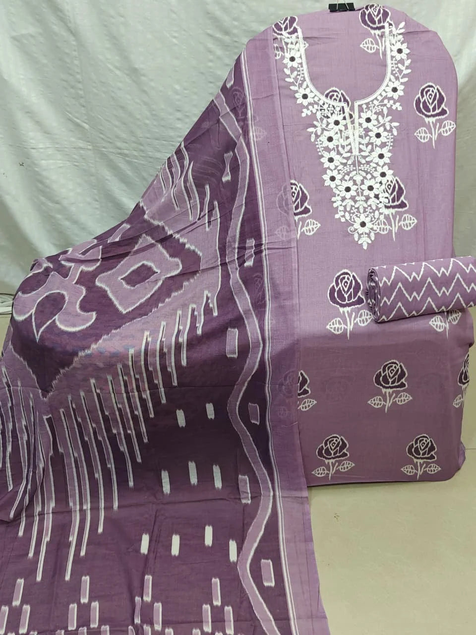 Mauve Rose Print Cotton Unstitched Suit with White Embroidered Neck, Zigzag Bottom & Ikat Dupatta