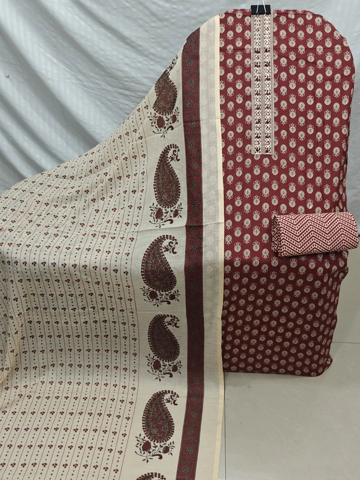 Maroon Buta Print Cotton Unstitched Suit with Mirror Work Placket, Chevron Bottom & Paisley Dupatta