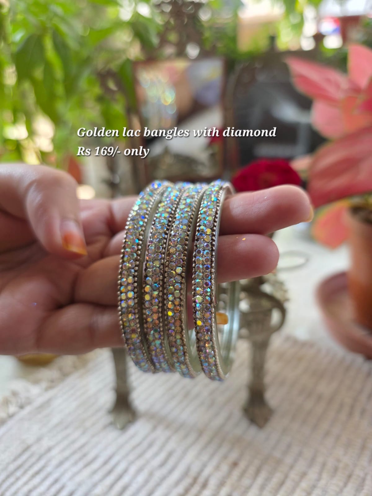 Golden lac bangles with silver diamond stones